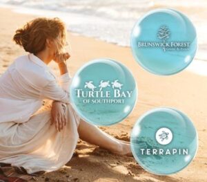 woman sitting on the beach, logos for Brunswick Forest, Turtle Bay of Southport, and Terrapin floating on the right
